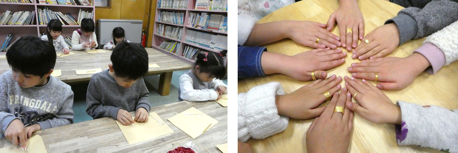 （写真左）児童会館で子どもたちが麦わら細工に挑戦。どの子も集中し真剣な表情に。（写真右）完成した指輪。麦わらは磨くと柔らかい光を放つ。